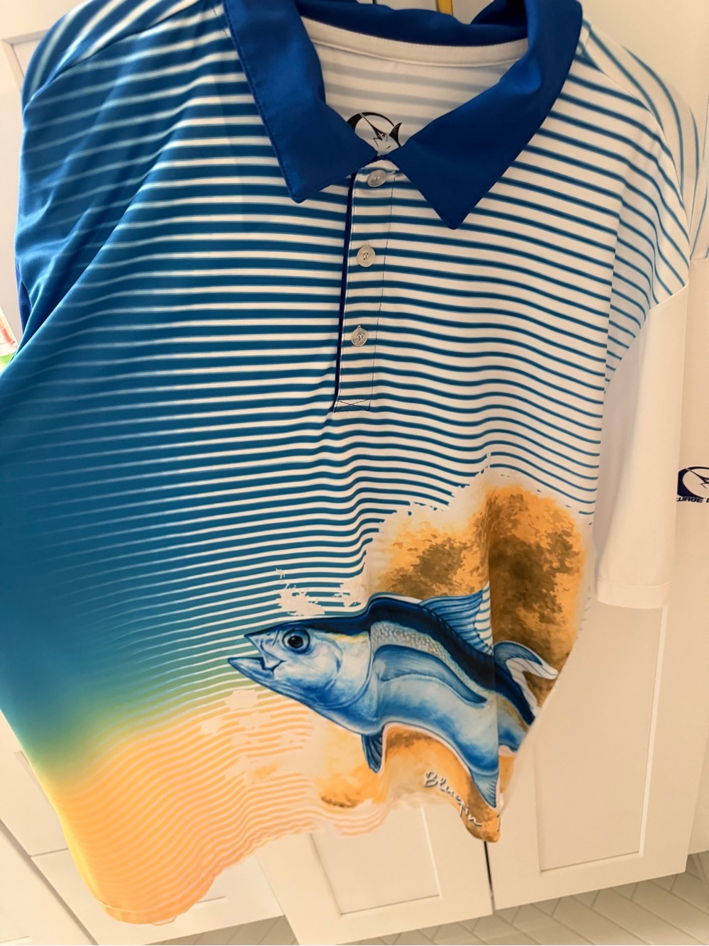 Men's Blue Striped Polo with Fish Graphic